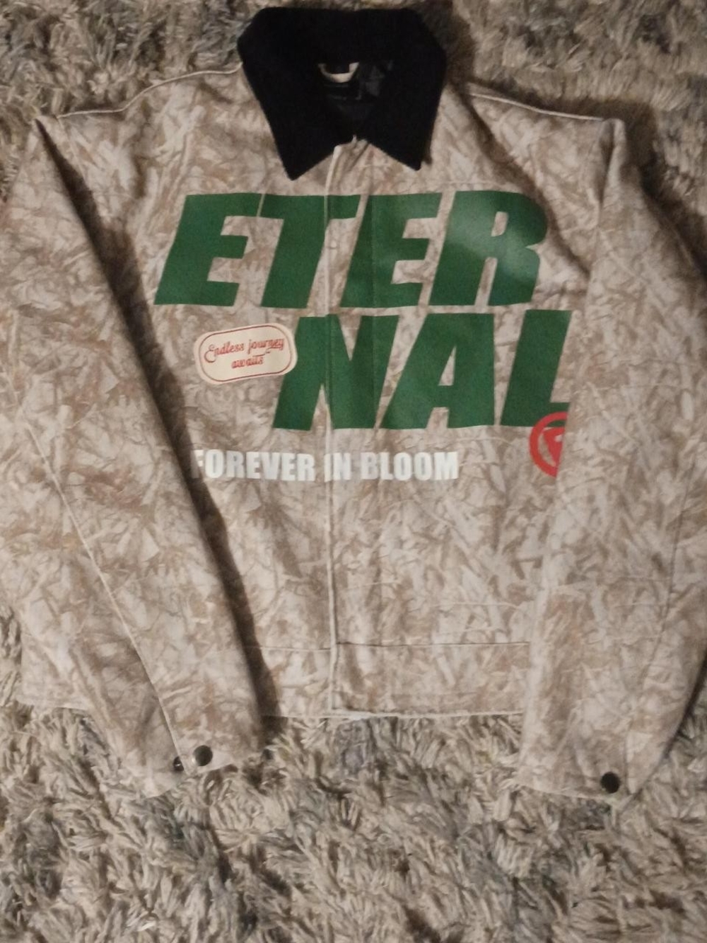 PacSun Beige Windbreaker with Green 'ETERNAL' Graphic